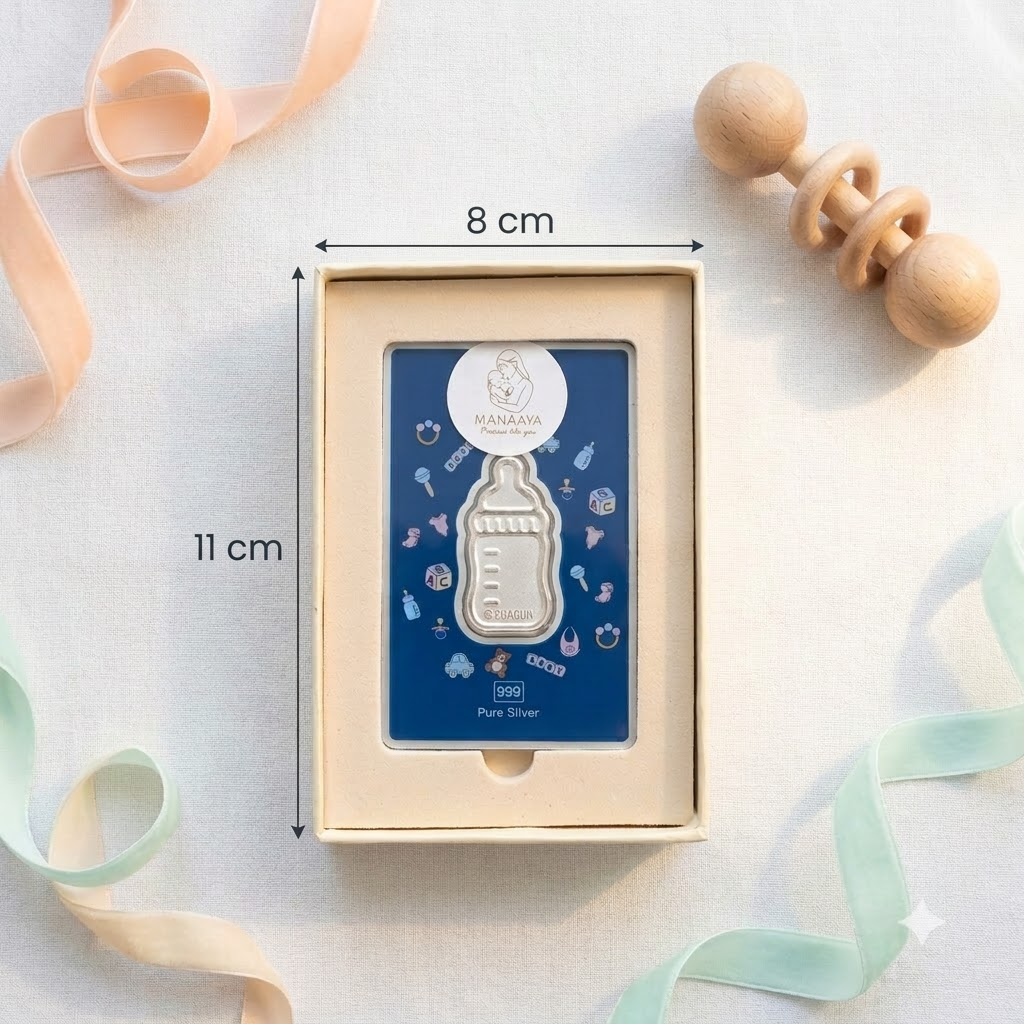 Gift box containing Manaaya milk bottle-shaped silver coin, shown with 8 cm by 11 cm measurements